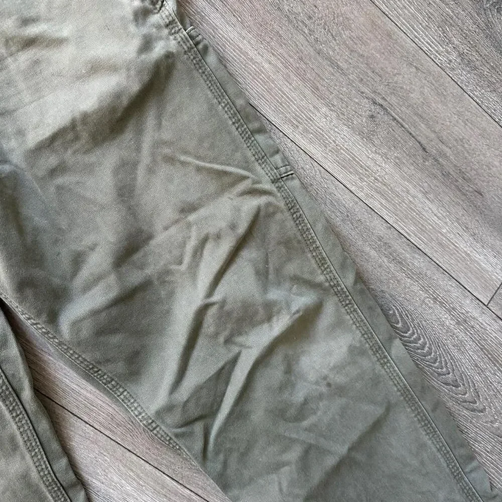 Distressed Carhartt relaxed fit olive green pants some staining  Size 34 x 34